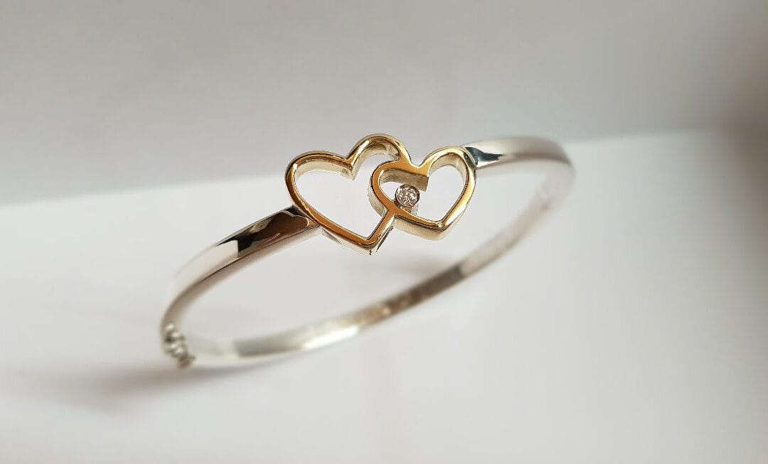 Zilveren armband hartjes van trouwringen